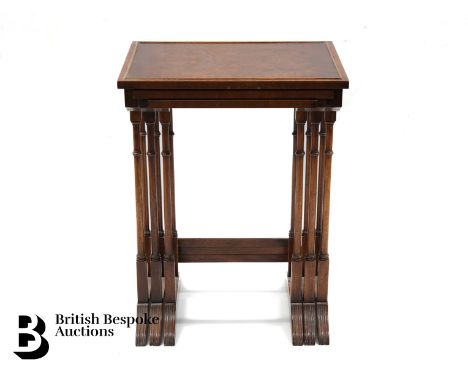 Early 20th century nest of tables. The tables having a rectangular top inlaid with birdseye maple panel, ring turned supports