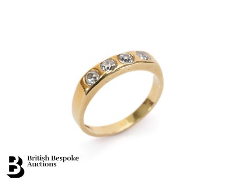 An 18ct yellow gold four stone diamond ring, set with approx 48 pts of old cut dias. Size P, weight approx. 4.87 gms.