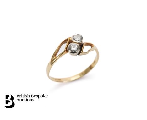 A 14ct yellow gold two stone diamond ring, set with approx 28 pts of dias. Size M+, weight approx. 1.58gms.&nbsp;