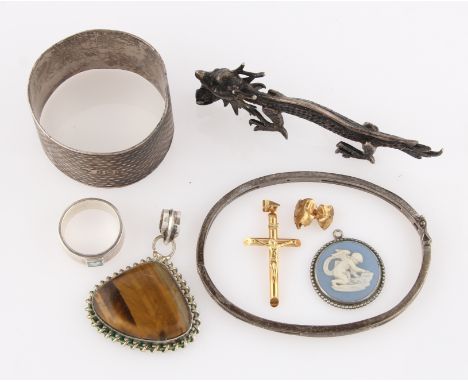 A lot to include a crucifix pendant, stamped 9kt, a hallmarked silver napkin ring, a hallmarked silver framed Wedgwood pendan