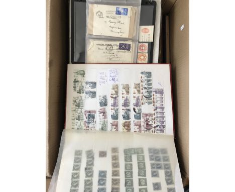 A box containing various albums containing post cards, stamps etc.