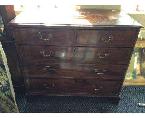 A late 19th century mahogany chest fitted with three long and two short drawers on bracket feet.