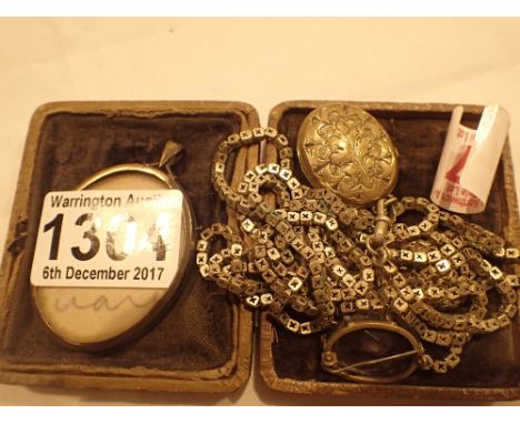 Victorian pinchbeck locket with photographs muff chain mourning brooch and amethyst brooch