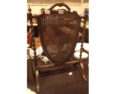 Victorian shield shaped rattan fire screen with barleytwist supports