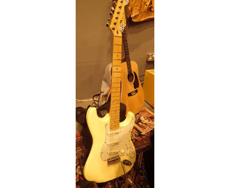 Deacon electric guitar with Marshall waist amplifier and a Kingsman gig bag