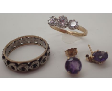 Mixed jewellery including a 9ct gold CZ set ring a 9ct gold and silver stone set band and a pair of a/f amethyst set stud ear