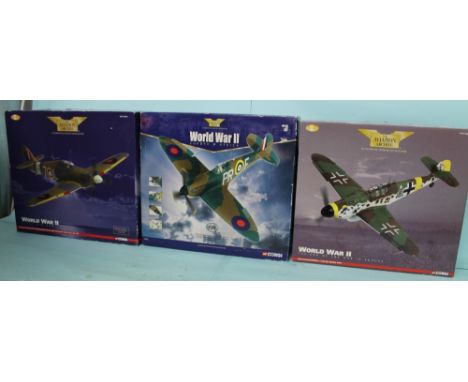 Corgi aviation lot of three 1/32 scale WWII aircraft to include Hurricane Spitfire Messerschmitt all models boxed NB: stands 