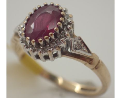 9ct ruby and diamond cluster ring approximately 1ct ruby size M