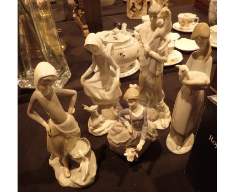 Five Lladro figurines Girl with Umbrella Girl with Lamb Girl with Goose Girl with Rabbit and Boy with Goat