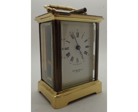 Brass and oak carriage clock by Taylor & Bligh