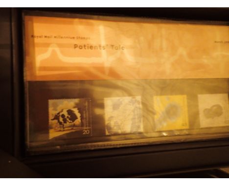 Royal Mail Millenium Collection including £50 of mint stamps and approximately 20 first day covers