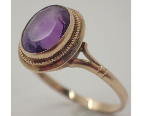 9ct gold ring set with a large amethyst Size O