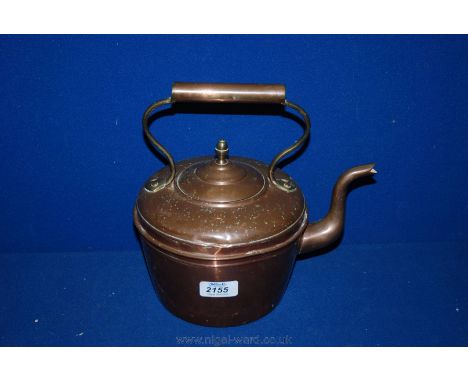 A Copper Kettle with acorn finial. 