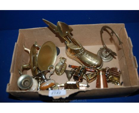 A quantity of Brass ornaments including miniature garden tools in a boot, urns, sheep, gong, etc.