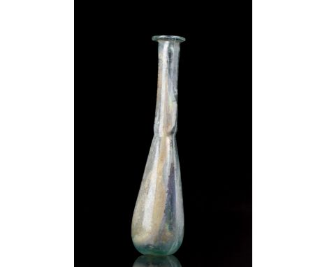 Ca. 100 AD A beautiful glass bottle with silver iridescence featuring a piriform body tapering to a long neck with a flat fol