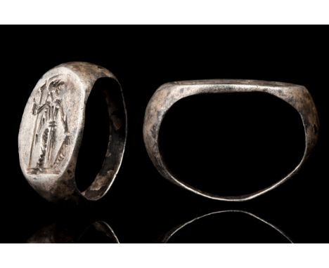 Ca. 100-300 AD A solid silver D-shaped ring with a bezel engraved with a standing figure of Minerva (Greek Athena), the godde