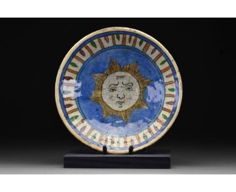 Iran, Ca. 17th-18th century AD A beautiful glazed ceramic bowl of a shallow form with flaring walls rising from a ring-shaped