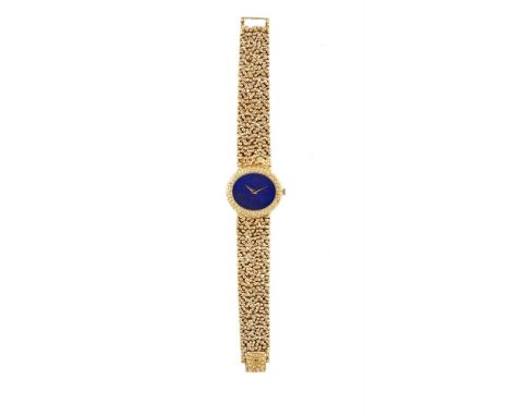 A LADY’S 18K GOLD WATCH WITH LAPIS LAZULI DIAL, BY PIAGET, CIRCA 1970 Of manual wind movement, 18 jewels, lapis lazuli dial, 