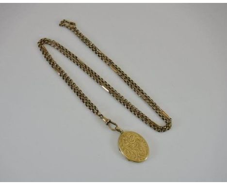A 9 carat gold locket with engraved scrolling foliate decoration to front and chain, approx 17 g total