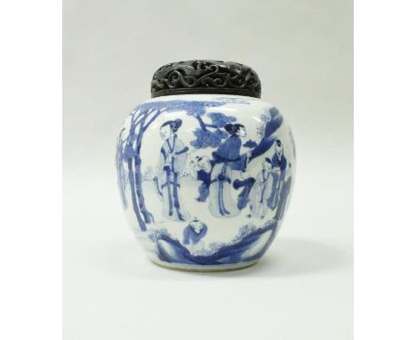 A Chinese Kangxi blue and white ginger jar, the main body decorated with figures in a garden setting, bears concentric ring m