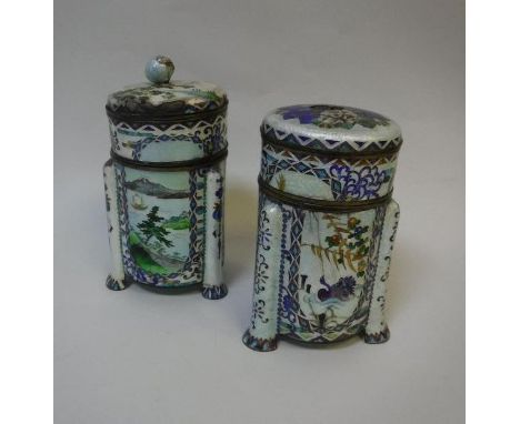 Two early 20th Century Chinese Ginbari cloisonné sectional tea caddies of circular form, raised on three feet protruding down