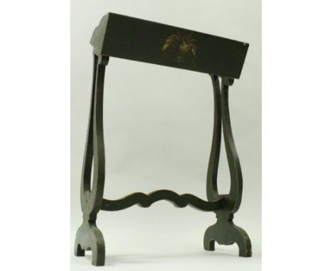 A Victorian painted book trough on lyre end supports united by a shaped stretcher, 52 cmx 73 cm