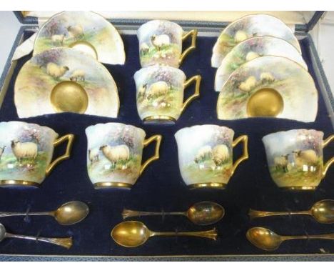 A Royal Worcester coffee set decorated by Ernest Barker with sheep in a landscape, date marked for 1934, together with six te