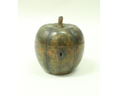 A George III painted fruitwood pumpkin shaped tea caddy, 14 cm high CONDITION REPORTS Has had woodworm treated and repaired, 