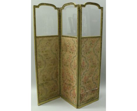 A 19th Century gilt and gesso framed three-fold vanity screen with glass top and fabric decorated panels, 168 cm wide x 193 c
