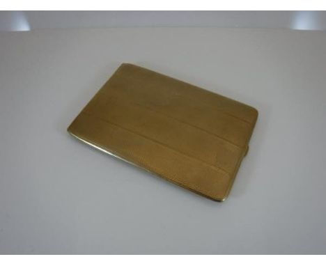 A 9 carat gold cigarette case with engine-turned decoration, 11.5 cm long, approx 115.6 g CONDITION REPORTS Light scratches t