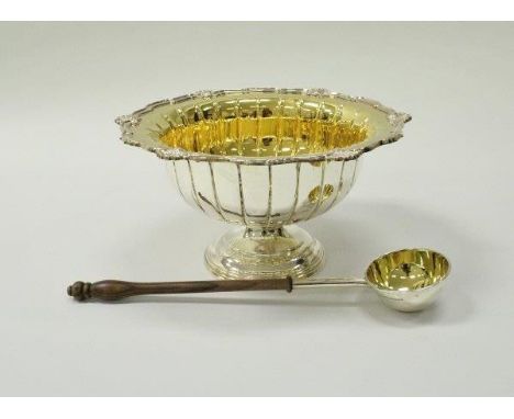 A 20th Century silver punch bowl with gilt-washed interior, marked to base "James Dixon & Sons", 19 cm high, approx 64 oz, to