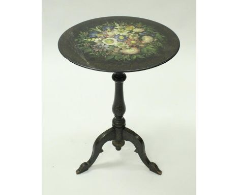 A Victorian painted slate tilt top circular occasional table, the top with hand painted floral spray on an ebonised baluster 
