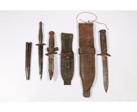 Commando type dagger and two American style fighting knives. (3) 