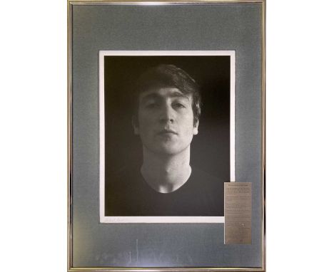 A well mounted, framed and glazed presentation with a lithograph print of a portrait depicting John Lennon by Astrid Kirchher