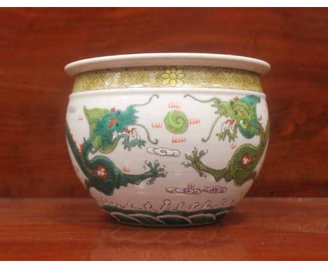 CHINESE CERAMIC PLANTER
with dragon in green decoration, 15cm diameter 