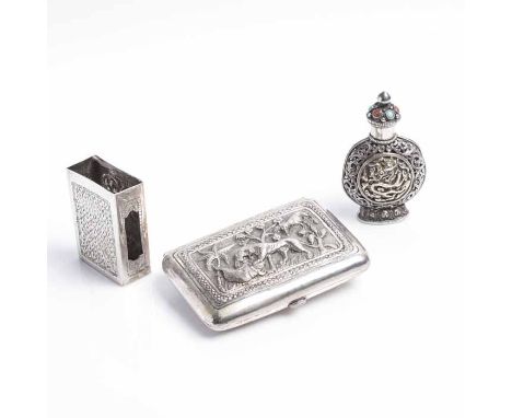 THREE EASTERN SILVER ITEMS
including an Indian white metal cigarette box with a scene of a man being devoured by a tiger, 9cm