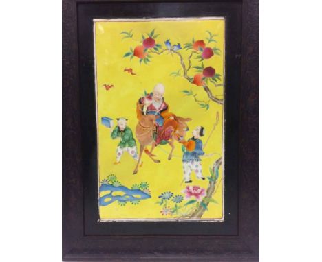 PAIR OF CHINESE FAMILLE JAUNE CERAMIC PANELS
depicting shao lao, framed in wooden frames, 52cm x 39cm overall  CONDITION REPO