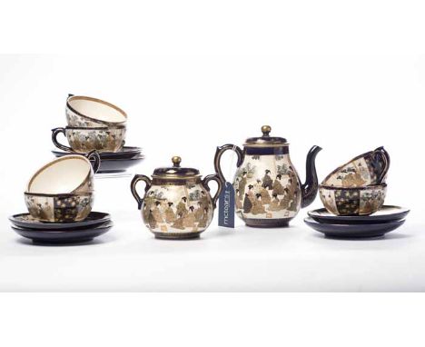 JAPANESE SATSUMA TEA SERVICE
with six cups, saucers, tea pot, milk jug and lidded sugar bowl all decorated with scenes of fem