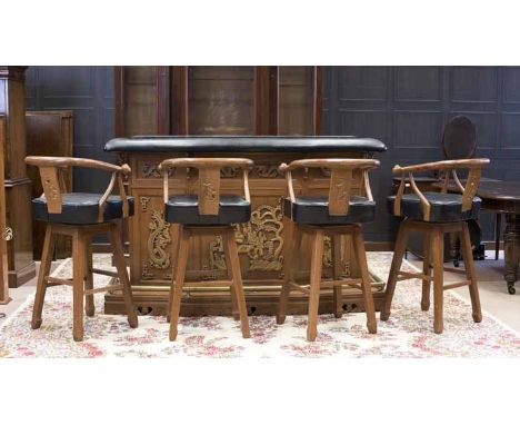 CHINESE CARVED WOOD BAR AND FOUR STOOLS
the bar front with carved dragons and figures, the reverse fitted with bottle stand a