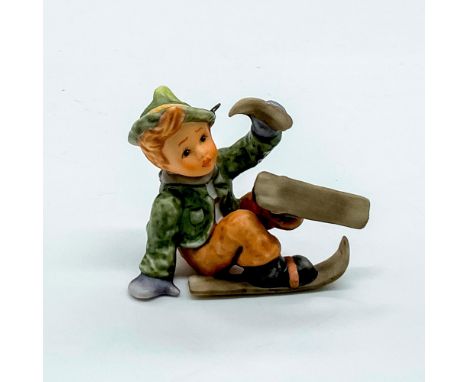 Hand painted ornament with loop of a fallen boy with green coat holding a broken ski. Goebel backstamp. Issued: 2002Dimension