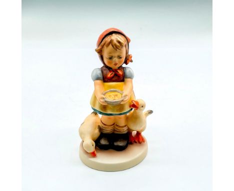 Hand painted girl with orange cap feeding ducks. Goebel backstamp. Impressed mark 197. Issued: 2004Dimensions: 4.5"H x 2.5" d