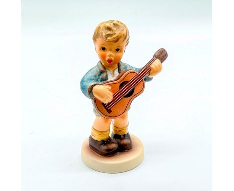 Limited edition 4511 of 7500, hand painted boy in blue jacket with guitar. Goebel backstamp. Impressed mark 2171/B. Issued: 2