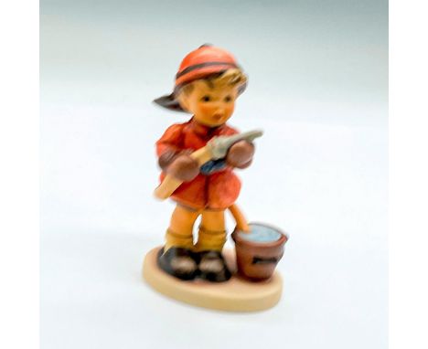 Hank painted boy in red coat and hat holding a fire hose. Goebel Germany backstamp. Impress 2030. Issued: 2002Dimensions: 2.7