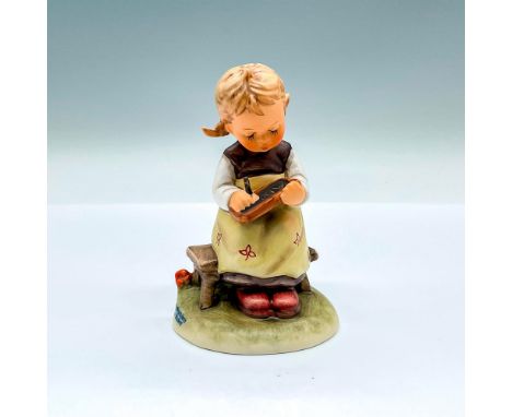 Hand painted figure of a young girl writing her ABC on a small chalkboard. Goebel backstamp. Artist: M.I. HummelIssued: 2004D
