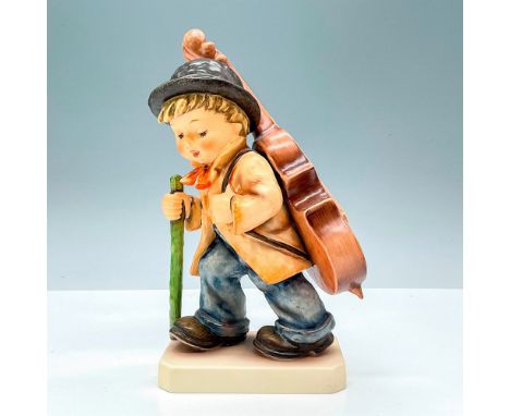 Hummel porcelain figure featuring boy with cello on back. Goebel backstamp TMK7. M. I. Hummel impressed backstamp. Caribbean 