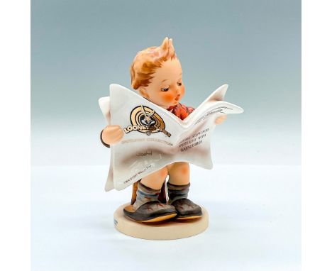 Limited edition hand painted figure of a young boy reading the June 1997 Goebel-Gazette. Goebel backstamp. Artist: M.I. Humme
