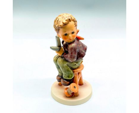 Hand painted boy with large pair of scissors. Goebel backstamp. Impress mark 308. Issued: 1991Dimensions: 5.75"H x 3"dia.Manu
