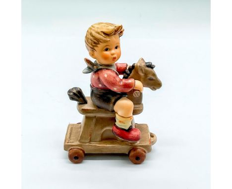 Hand painted child with red shoes on a toy rolling horse. Goebel backstamp. Impressed mark 2020. Issued: 2006Dimensions: 3.25