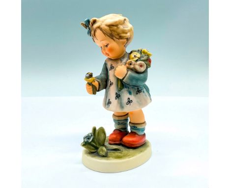 Hand painted porcelain figure of a girl admiring a bee on a flower. First issue 2002. Goebel backstamp. Artist: M.I. HummelIs