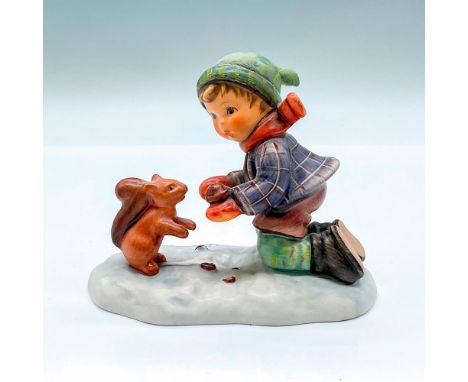 Limited edition hand painted figure of a young boy feeding a squirrel. Goebel backstamp. Artist: M.I. HummelIssued: 1998Dimen